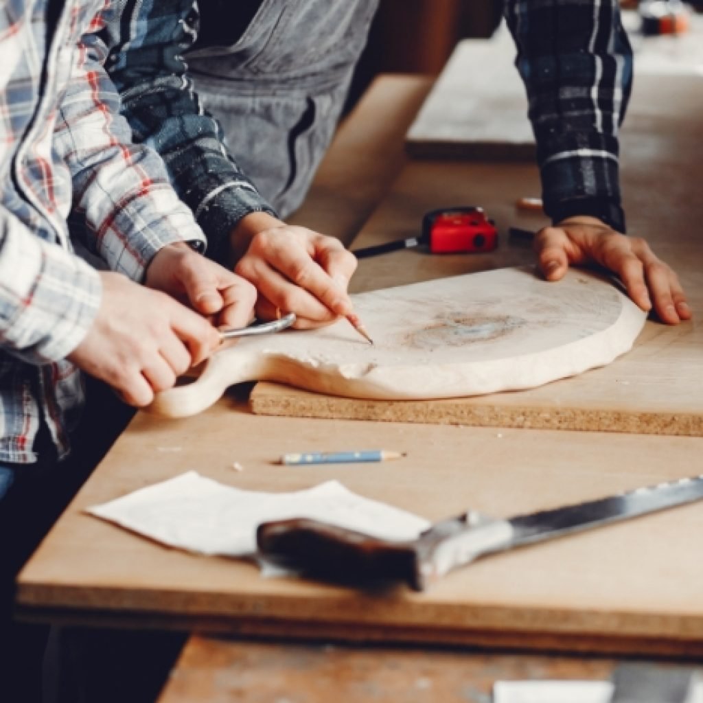 the-carpenter-works-with-a-tree-JX5DMPH-1024x1024